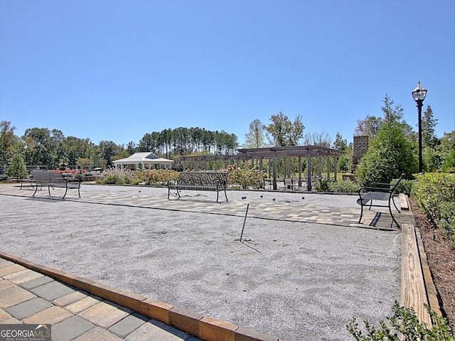 view of property's community featuring a pergola