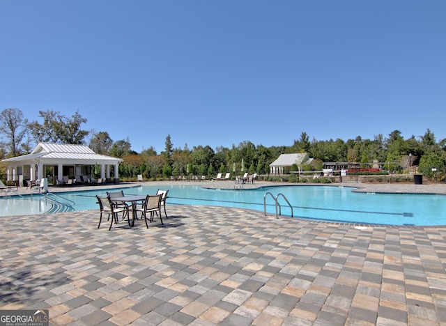 view of pool with a gazebo and a patio area