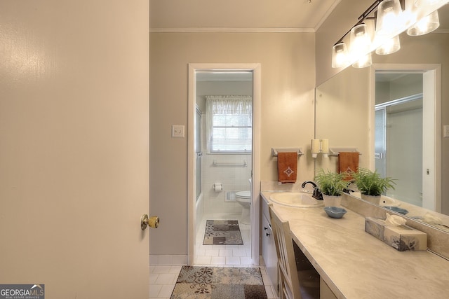 full bathroom with tile patterned flooring, ornamental molding, vanity, and toilet