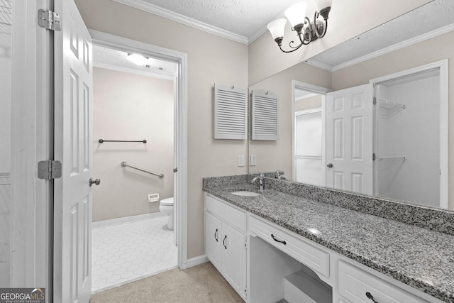 bathroom with vanity, toilet, crown molding, a textured ceiling, and an inviting chandelier