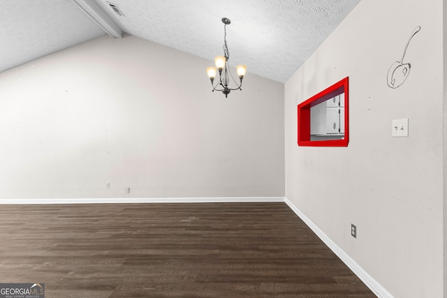 unfurnished dining area featuring an inviting chandelier, vaulted ceiling with beams, wood finished floors, and visible vents