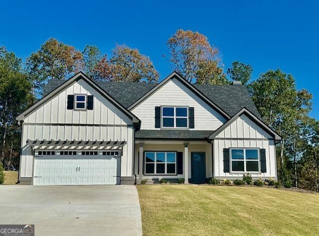 view of front of home with a front lawn