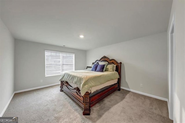 8819 Sibella Ct, Lithia Springs, GA 30122 - carpeted bedroom featuring baseboards and recessed lighting
