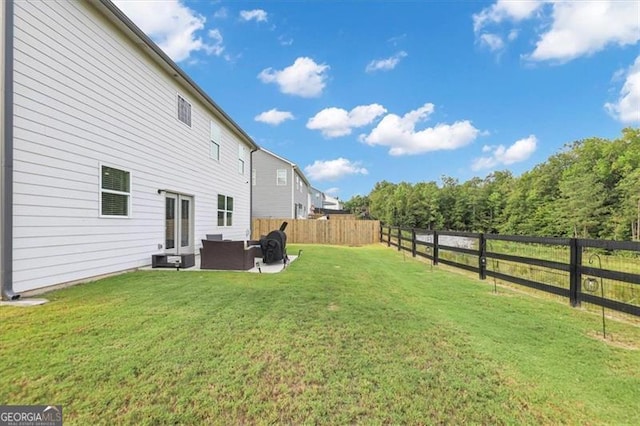 view of yard with an outdoor hangout area and a patio area