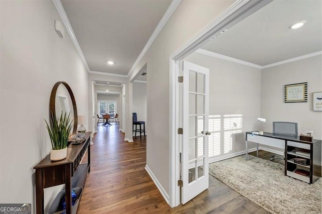 office with dark wood-type flooring and ornamental molding