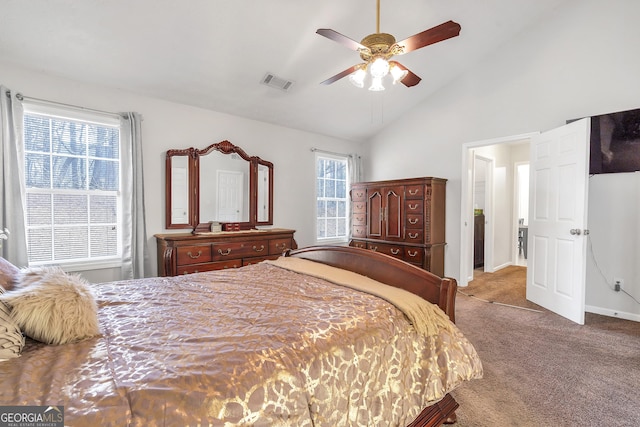 carpeted bedroom featuring lofted ceiling and ceiling fan