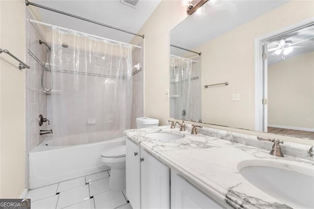 full bathroom with tile patterned flooring, vanity, shower / bathtub combination, and toilet