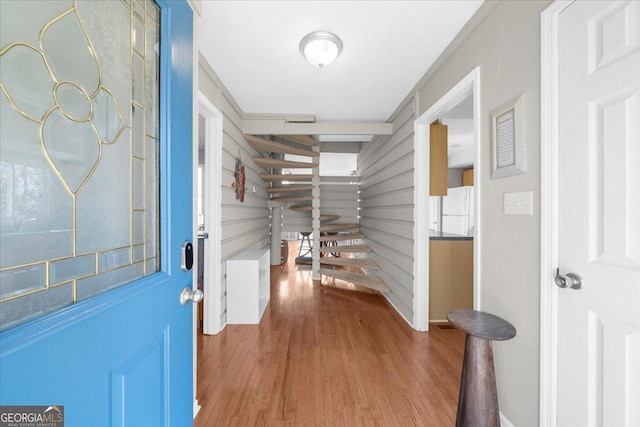 foyer with hardwood / wood-style floors