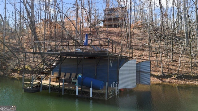 view of dock with a water view