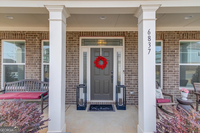 entrance to property with covered porch