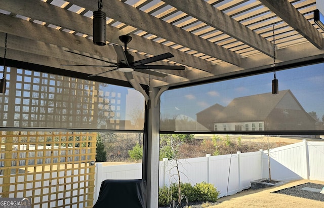 view of patio / terrace with ceiling fan and a pergola