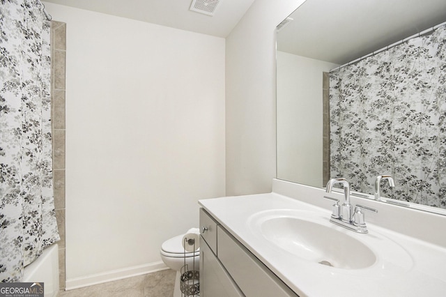 full bathroom with tile patterned floors, vanity, toilet, and shower / bath combo