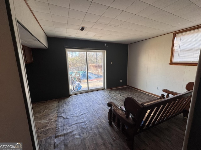 sitting room with hardwood / wood-style flooring