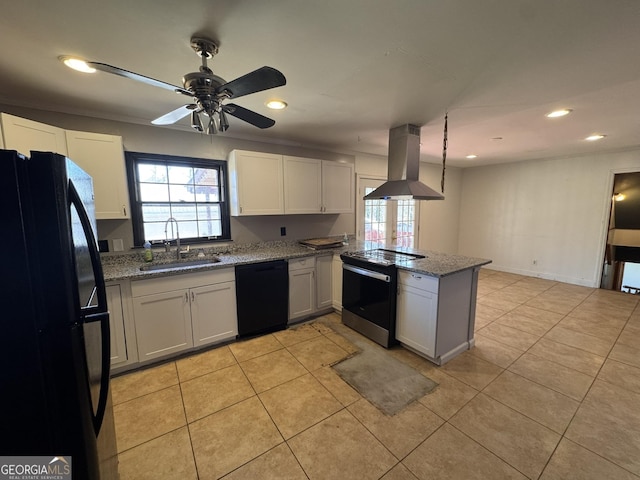 kitchen featuring sink, island range hood, black appliances, white cabinets, and kitchen peninsula