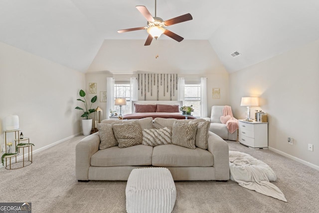 carpeted bedroom with lofted ceiling and ceiling fan