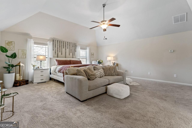 bedroom featuring multiple windows, light colored carpet, and high vaulted ceiling