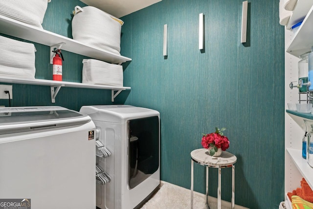 laundry room with separate washer and dryer