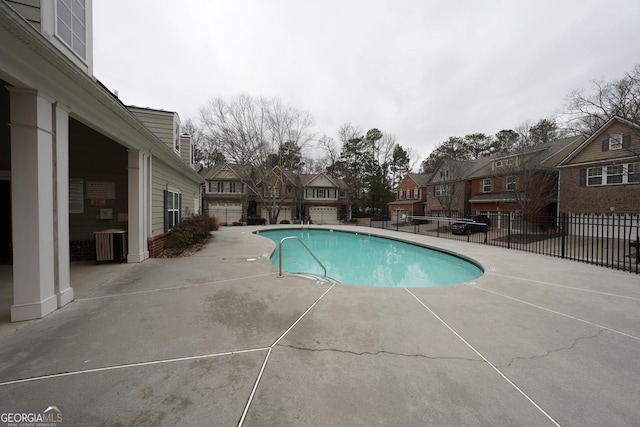 view of pool with central AC and a patio area