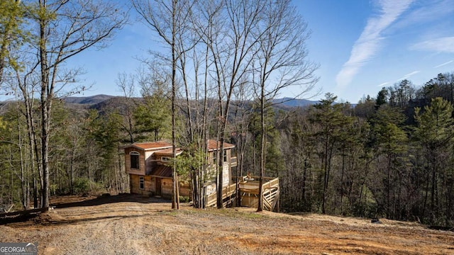 view of front of home with a mountain view