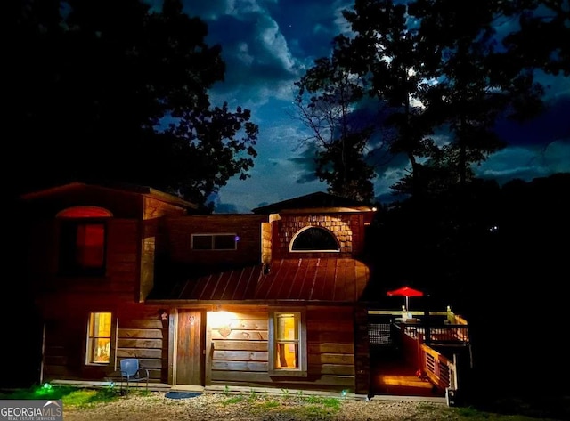 170 Community Hill Dr Unit 54, Blue Ridge, GA 30513 - back of house at twilight featuring metal roof