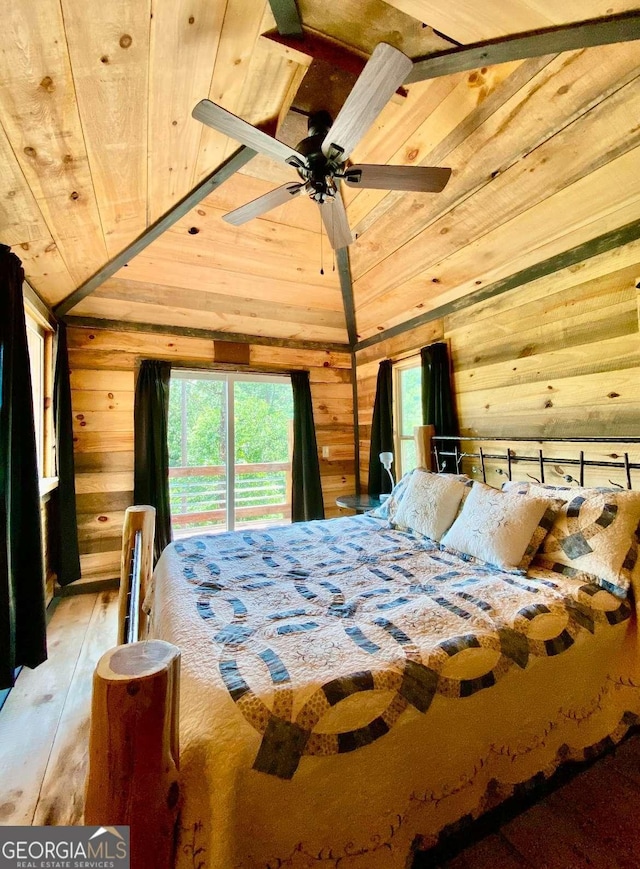 bedroom featuring wood ceiling, lofted ceiling, wooden walls, and wood-type flooring