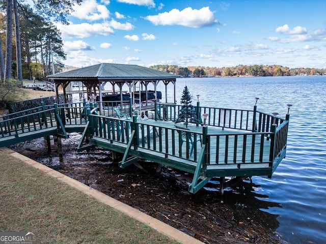 dock area with a water view