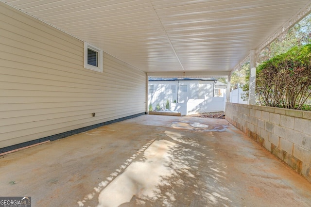 view of patio with a carport