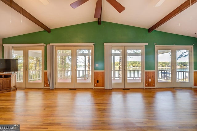 entryway featuring french doors, ceiling fan, light hardwood / wood-style floors, and lofted ceiling with beams