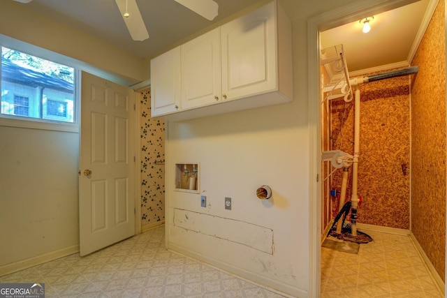 washroom featuring ceiling fan, cabinets, and washer hookup