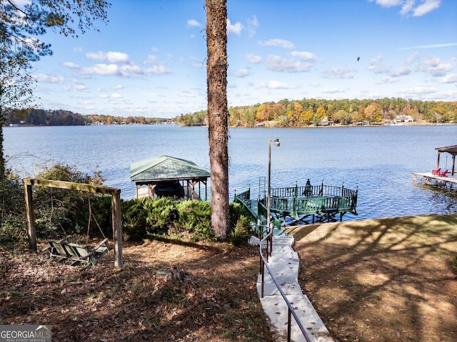 dock area featuring a water view