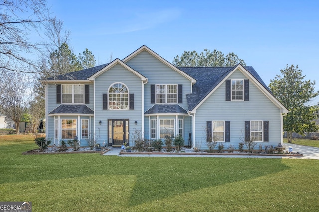 view of front of home featuring a front yard