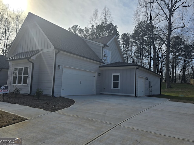 view of side of property featuring a garage