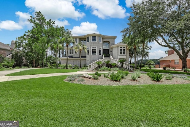 view of front of home with a front yard