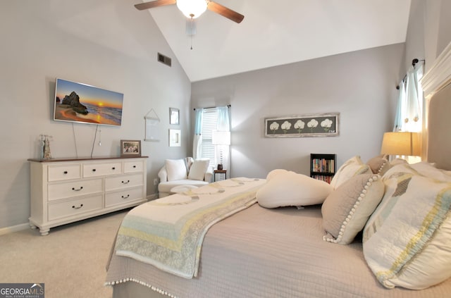 bedroom with ceiling fan, high vaulted ceiling, and light carpet