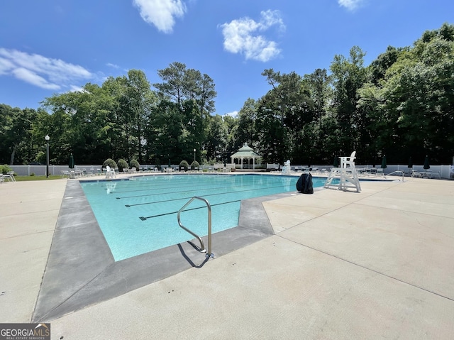 view of pool with a gazebo and a patio