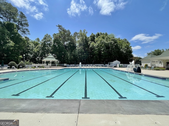 view of swimming pool with a gazebo