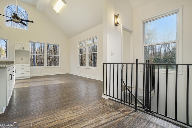 201 Windflower Ct, Canton, GA 30115 - interior space featuring a ceiling fan, dark wood-style floors, plenty of natural light, and high vaulted ceiling