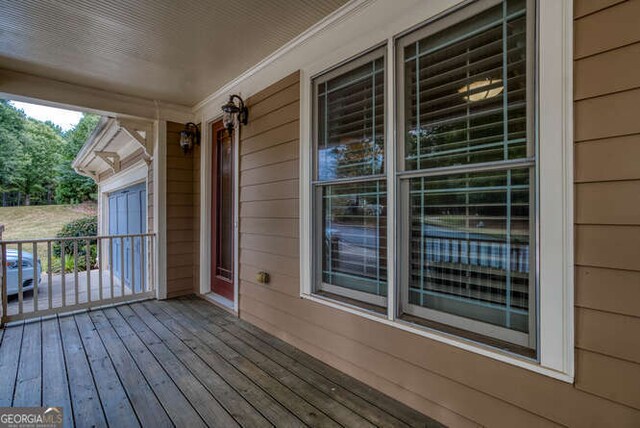 craftsman house with a garage and a porch