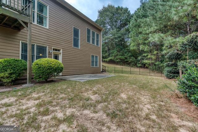 view of yard with a patio area and fence