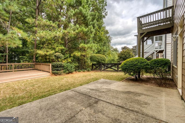 view of yard with a patio and a deck