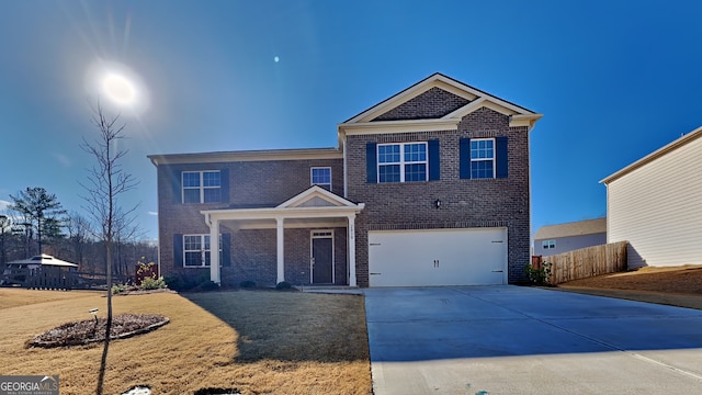 front facade with a garage and a front lawn