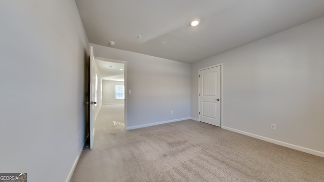 empty room with light carpet