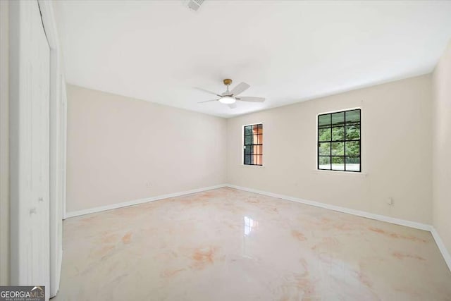 spare room featuring ceiling fan