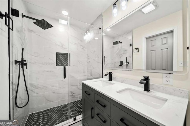 bathroom with vanity and an enclosed shower