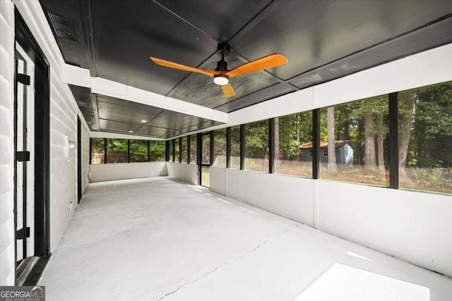 interior space featuring ceiling fan