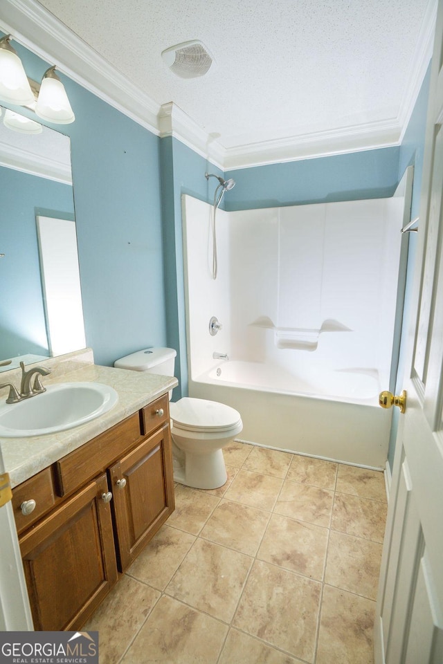 full bathroom with tile patterned floors, toilet, ornamental molding, shower / washtub combination, and vanity