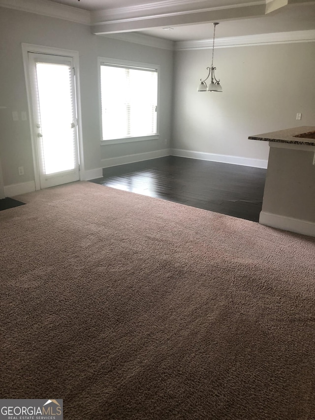284 Madison Grace Ave, Mcdonough, GA 30252 - unfurnished room with baseboards, crown molding, and dark wood-style flooring