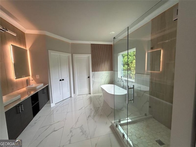 bathroom with crown molding, vanity, and independent shower and bath