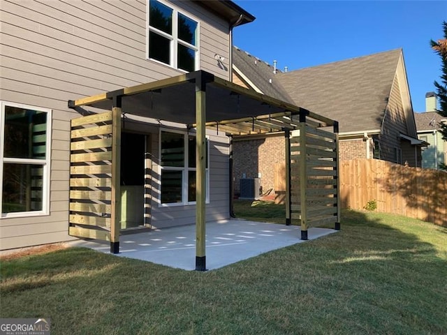 back of property featuring cooling unit, a lawn, a patio area, and a pergola