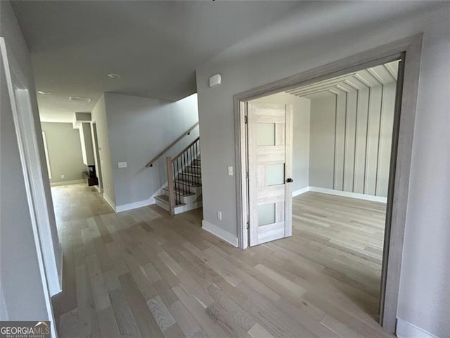 hall featuring light hardwood / wood-style flooring